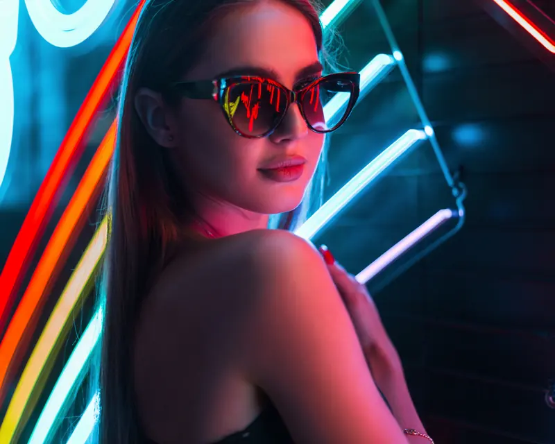 Neon signs after midnight — open late at Déjà Vu Minneapolis