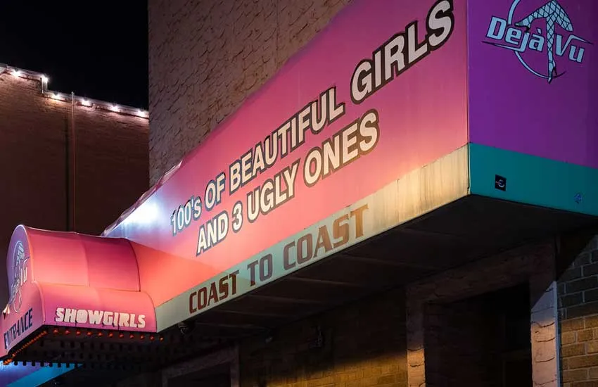 Entrance awning — 100's of beautiful girls and 3 ugly ones