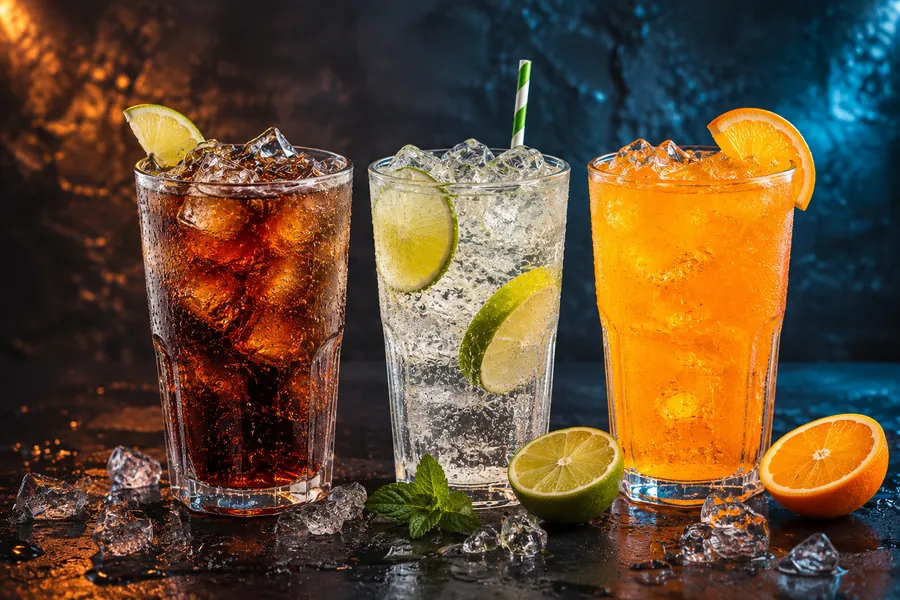 Iced cola, lime soda, and orange soda at the Déjà Vu juice bar
