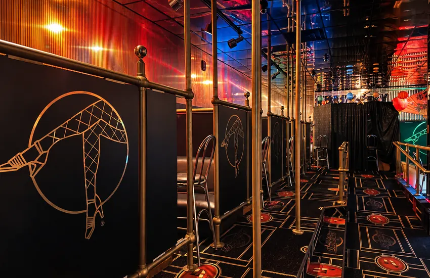 Private booths upstairs with the Déjà Vu legs logo panels