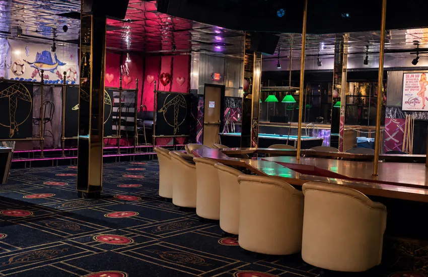 Upstairs seating along the rail by the pool tables and hearts room